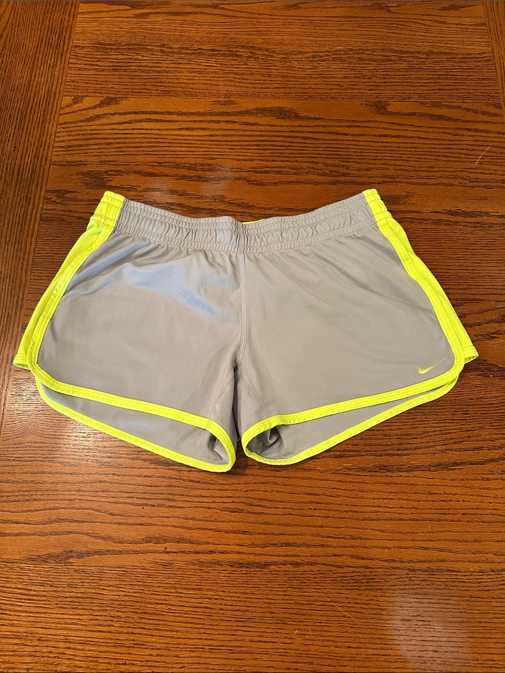 Nike Women's Light Gray Athletic Shorts with Neon Yellow Trim size small
